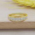 14k gold round channel-set lab grown diamond wedding band, front view showing fine craftsmanship