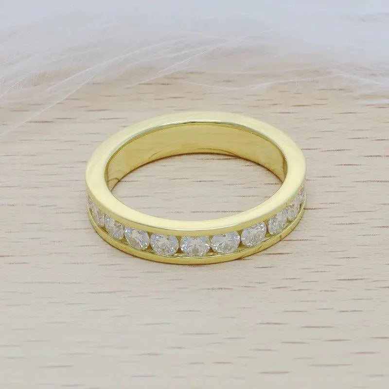 14k gold round channel-set lab grown diamond wedding band, side profile view showing fine craftsmanship