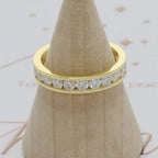 14k gold round channel-set lab grown diamond wedding band, sparkle detail shot showing fine craftsmanship
