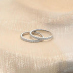 14k gold round lab grown diamond wedding band, three-quarter view showing fine craftsmanship with brilliant sparkle