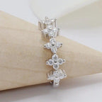 14k gold round dainty lab grown diamond wedding band, sparkle detail shot showing fine craftsmanship