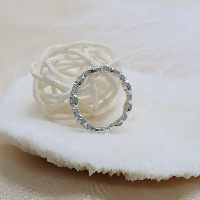 14k gold round lab grown diamond wedding band, side profile view showing fine craftsmanship with brilliant sparkle