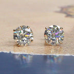 14k gold round prong-set lab grown diamond stud earrings, angled studio shot showing fine craftsmanship