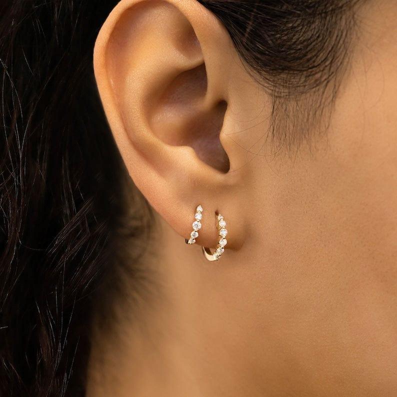 14k gold round lab grown diamond hoop earrings, styled on model showing fine craftsmanship