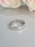 14k gold round stackable lab grown diamond eternity band, styled on model showing fine craftsmanship