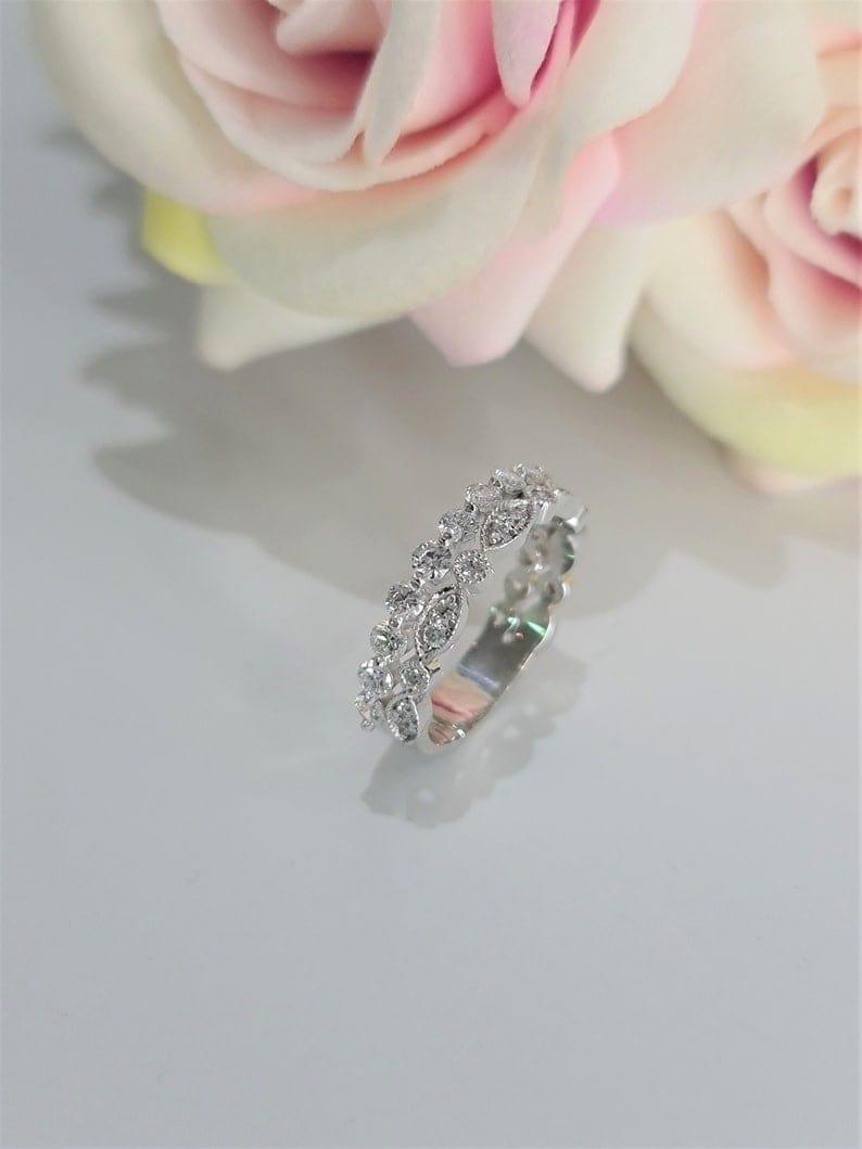 14k gold round stackable lab grown diamond eternity band, top angle view showing fine craftsmanship