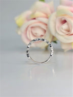 14k gold round stackable lab grown diamond eternity band, three-quarter view showing fine craftsmanship