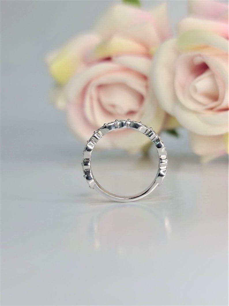14k gold round stackable lab grown diamond eternity band, three-quarter view showing fine craftsmanship
