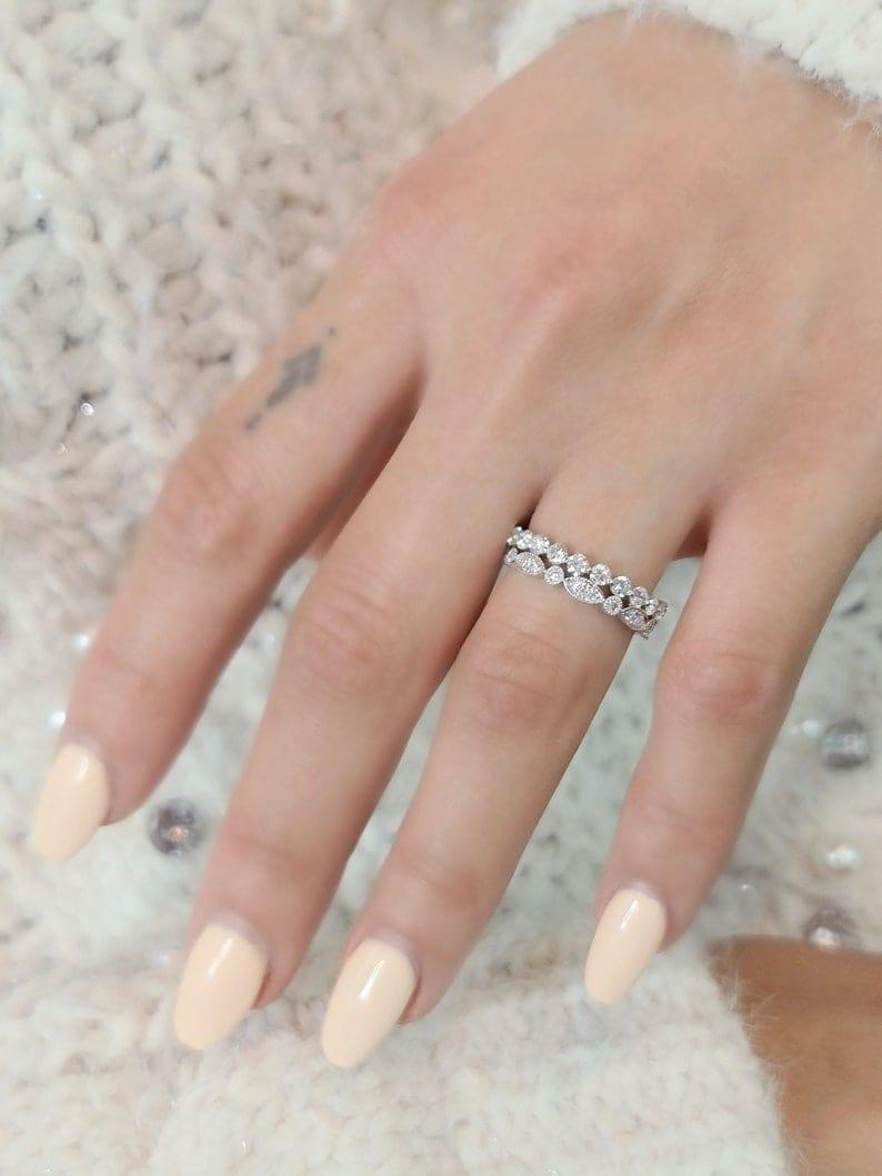 14k gold round stackable lab grown diamond eternity band, detailed close-up showing fine craftsmanship