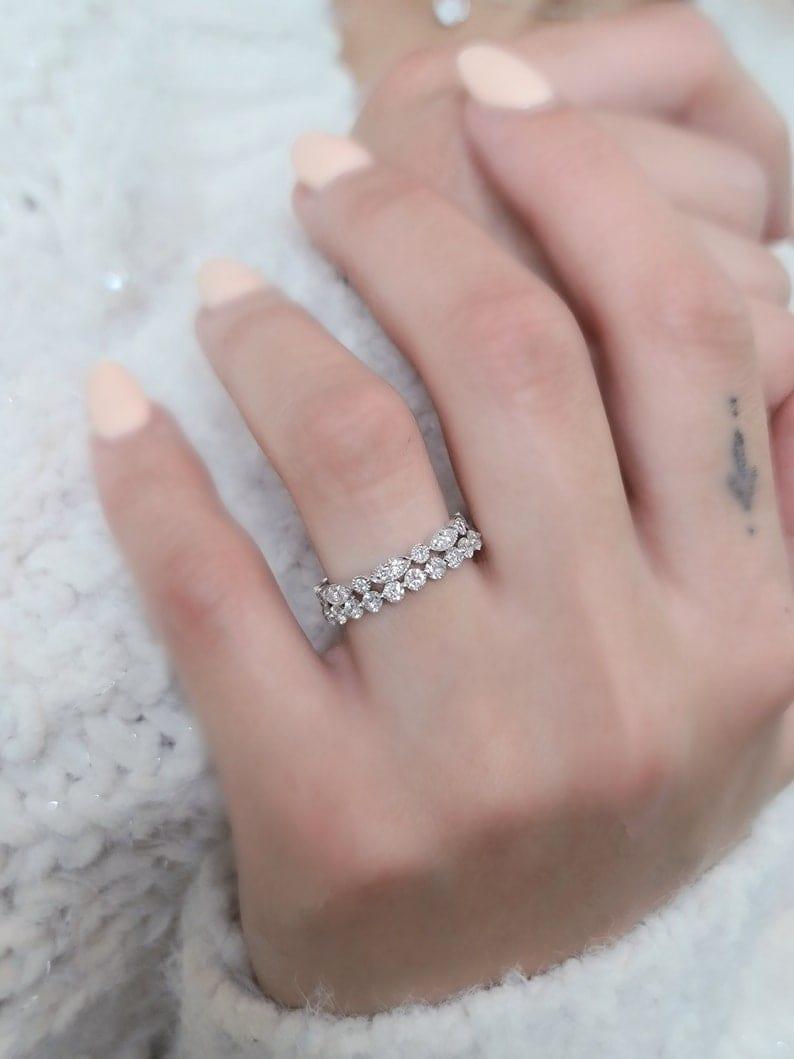 14k gold round stackable lab grown diamond eternity band, lifestyle shot showing fine craftsmanship