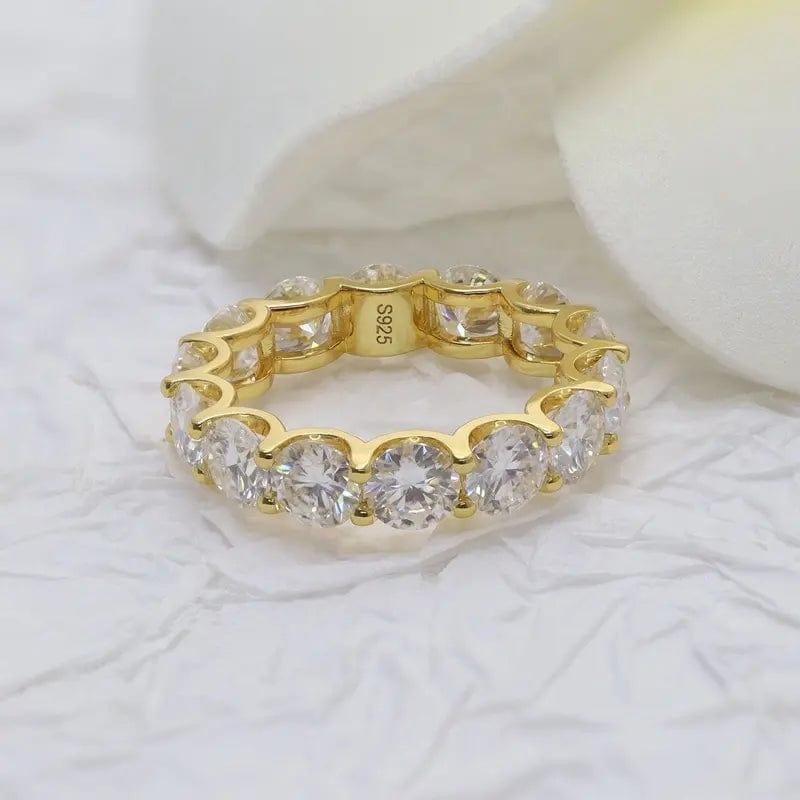 14k gold round lab grown diamond eternity band, front view showing fine craftsmanship with brilliant sparkle